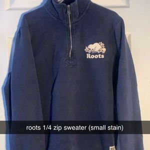 Navy blue 1/4 zip roots sweater.